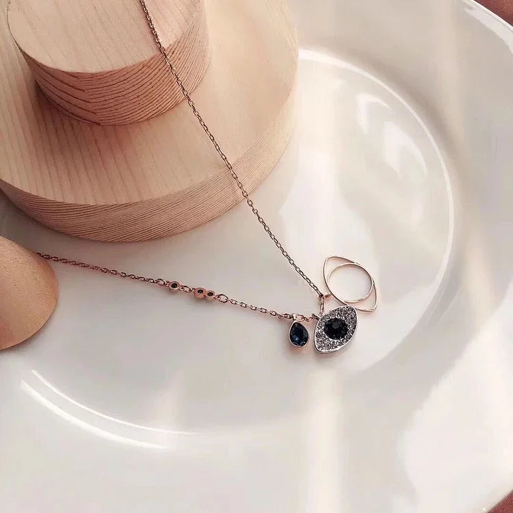 Amira's Enchanting Boze Oog Ketting en Armband Set