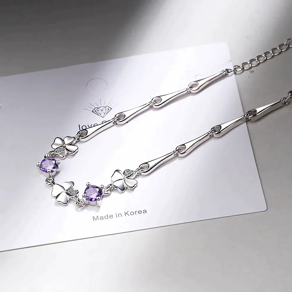 Charms of Fortune: Stunning Lucky Four-Leaf Clover Bracelet with Beautiful Gemstones