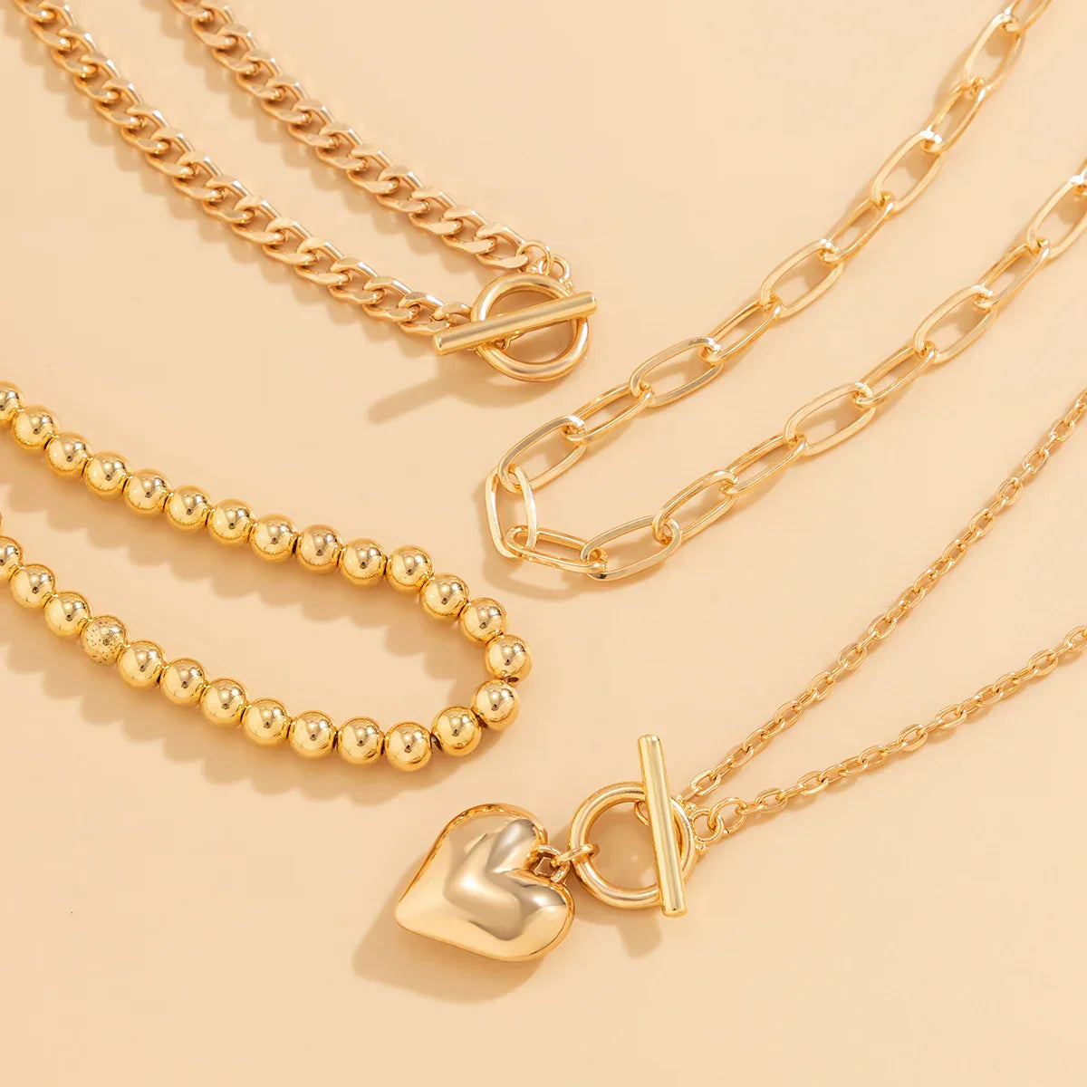 HeartGleam Necklace Set – Elegante Gouden Harthangers
