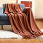 CozyWeave – Stijlvolle Gebreide Deken met Kwastjes