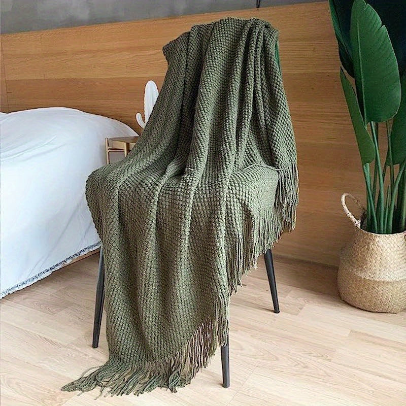 CozyWeave – Stijlvolle Gebreide Deken met Kwastjes