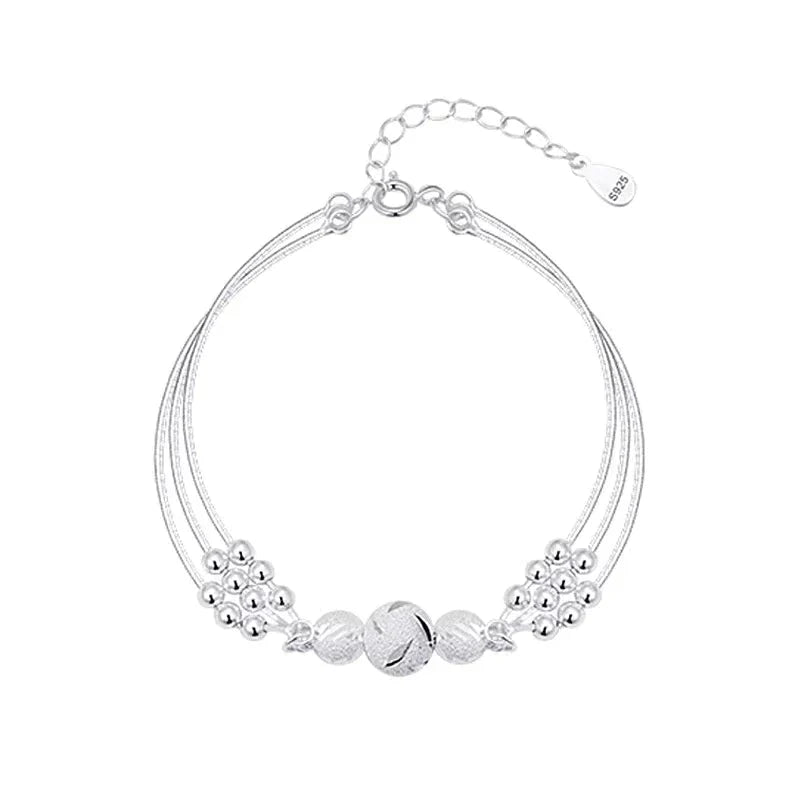 Elegante Zilveren Armband met Meerdere Stralende Parels