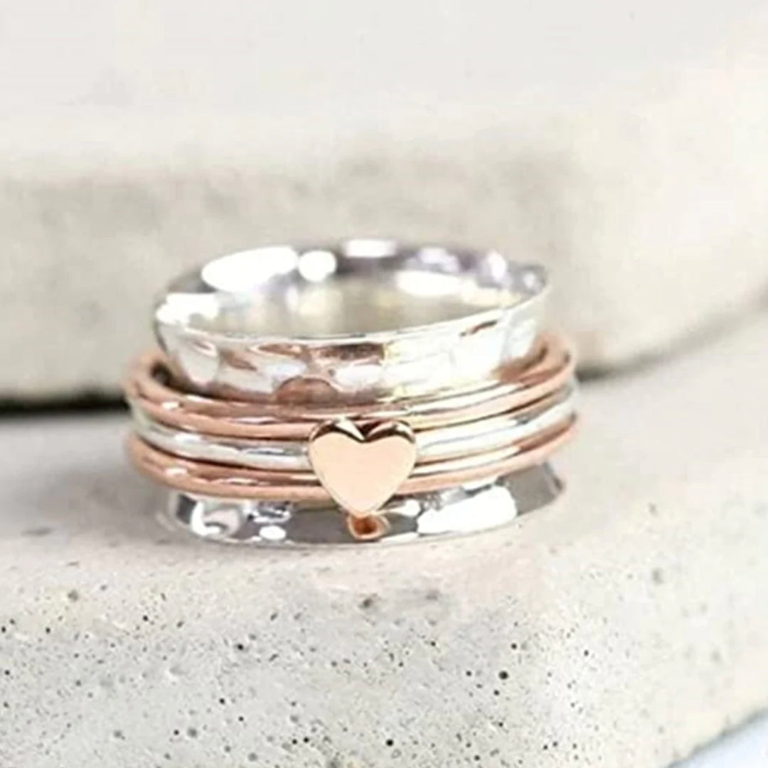 Amara Heart Spin Ring - A Touch of Elegance