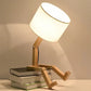 RutanFlex – Elegante Houten Tafellamp met Boekenvak
