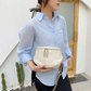 Lucy LeatherBag – Trendy en Schattige Leren Zadeltas